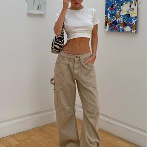 Lioness White Cropped Tee with Tan Cargo Jeans Overalls Look